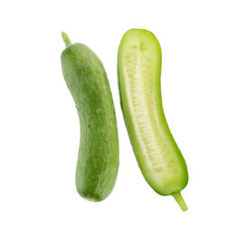 Close-up of green pepper against white background