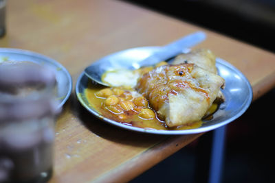 Close-up of meat in plate on table