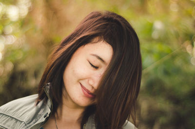 Close-up portrait of young woman