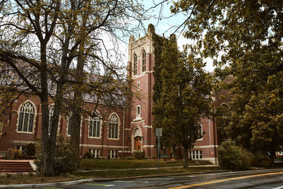 Trees by historic building