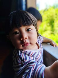 Portrait of cute girl looking away