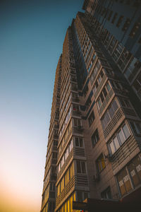 Low angle view of buildings against clear sky