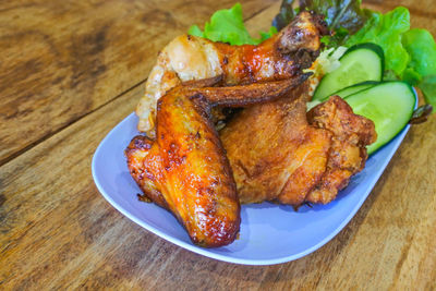 High angle view of meat in plate on table