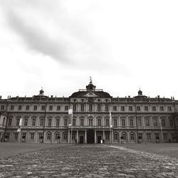 Building against cloudy sky