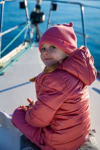 Portrait of cute girl looking away