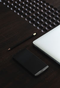 High angle view of computer keyboard on table