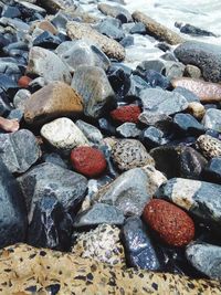 High angle view of stones on beach