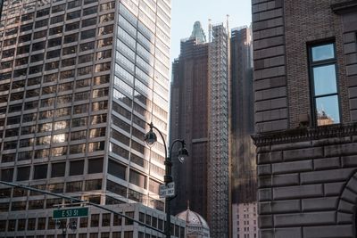 Low angle view of modern buildings in city