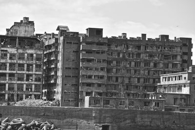 Buildings in city against sky