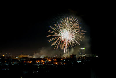 Firework display at night