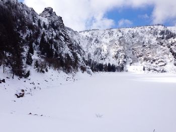 Scenic view of snow covered mountains