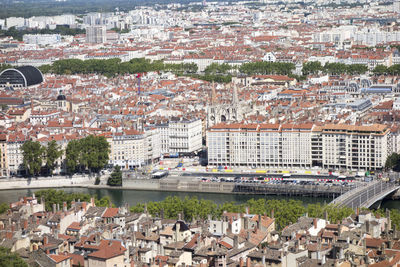 Aerial view of cityscape against sky