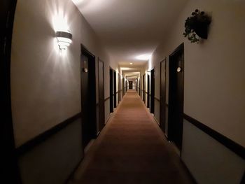 Illuminated corridor of building