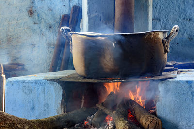 Traditional brazilian wood burning stove preparing food