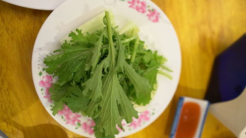 High angle view of salad in bowl on table