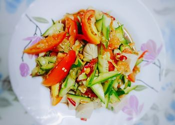High angle view of chopped vegetables in plate