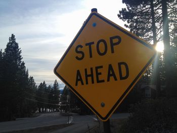 Close-up of road sign on road