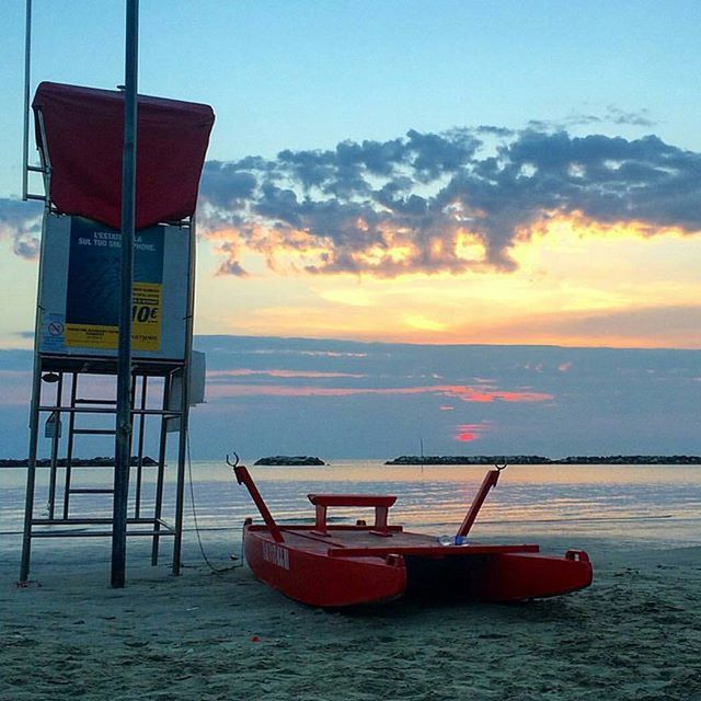 sea, horizon over water, water, nautical vessel, transportation, sky, boat, mode of transport, sunset, red, tranquility, tranquil scene, scenics, beauty in nature, nature, waterfront, idyllic, cloud - sky, orange color, beach