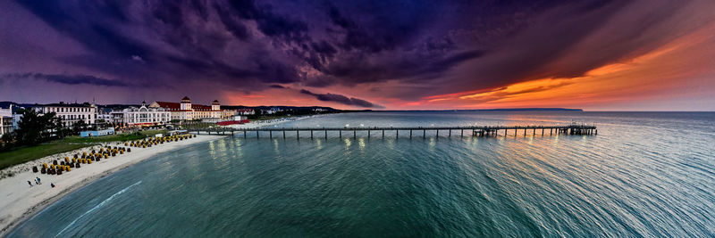 Panoramic view of pier in sea against sky