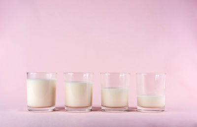 Close-up of drink in glass against white background