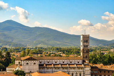 Elevated cityscape of lucca with the basilica of saint frediano, tuscany 