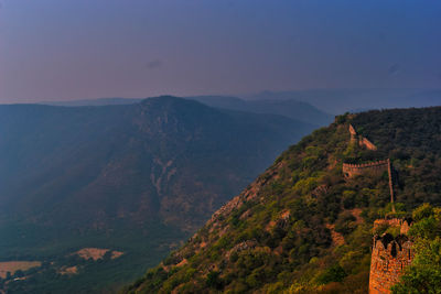 Scenic view of mountain range against sky