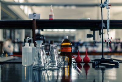 Close-up of glass containers in laboratory