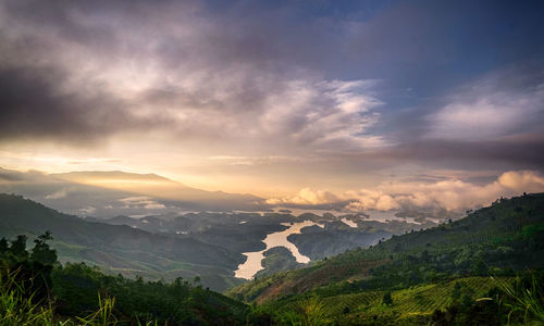 Scenic view of mountains against sky during sunset