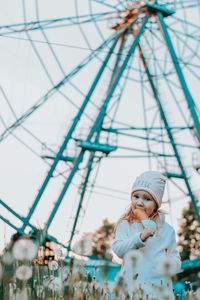 Portrait of young woman looking away
