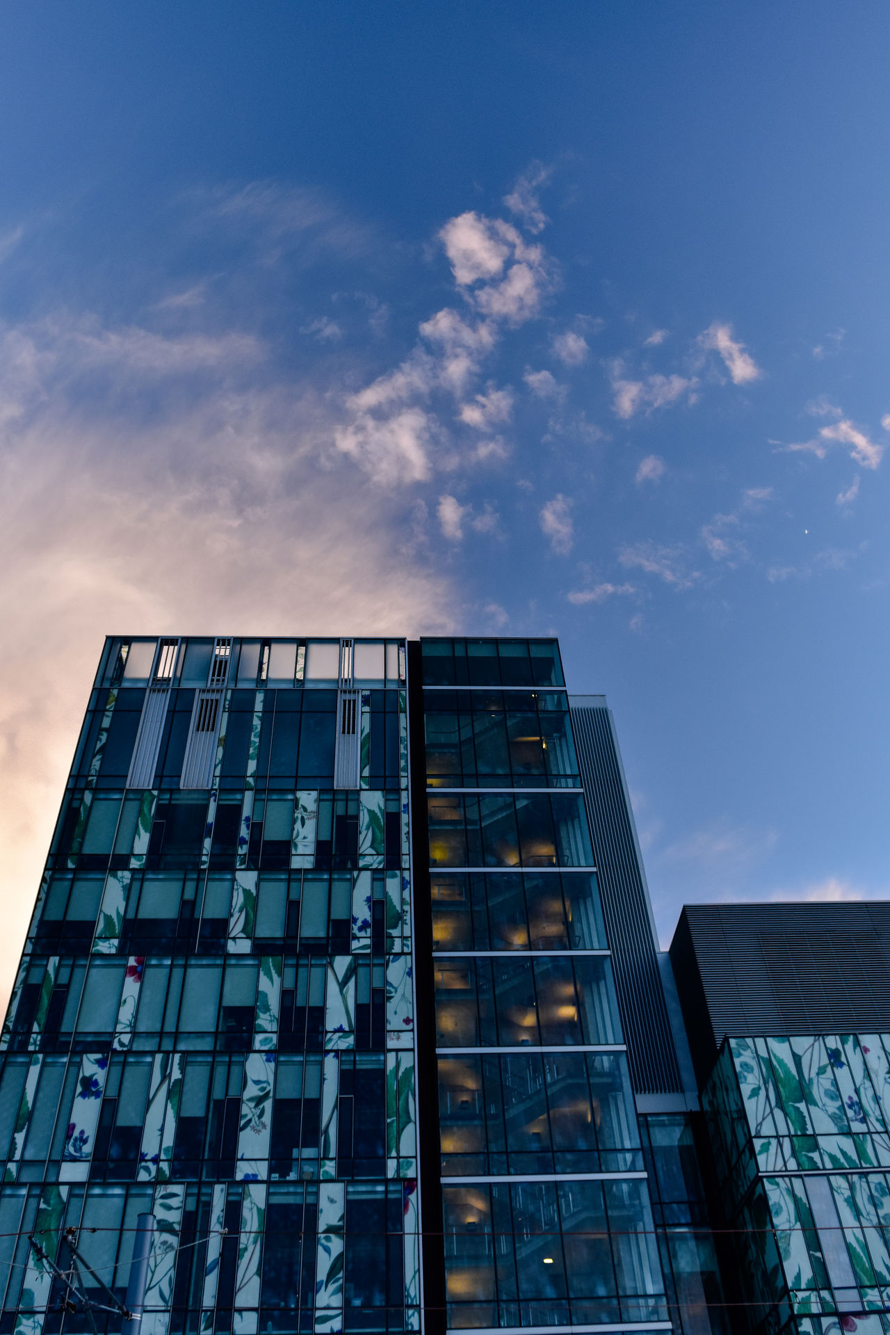 Sunset behind building