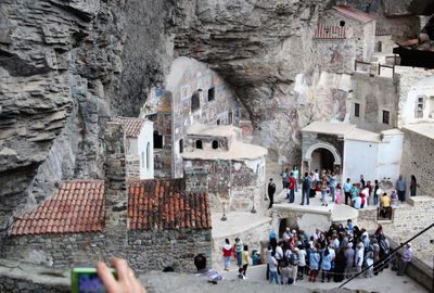 People in front of building