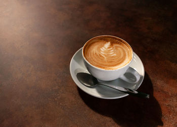 High angle view of coffee on table