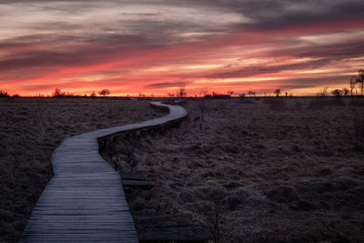 Scenic view of dramatic sky during sunset