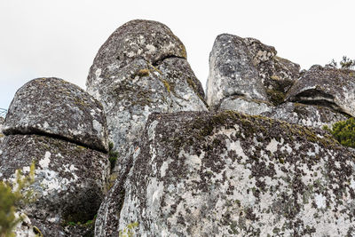 Low angle view of sculpture against sky