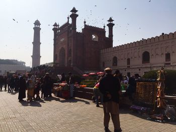 Tourists in front of historic building