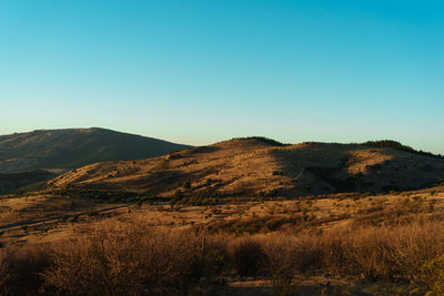 Scenic view of mountains against clear sky