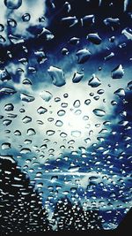 Close-up of water drops on glass