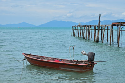 Boats moored in sea