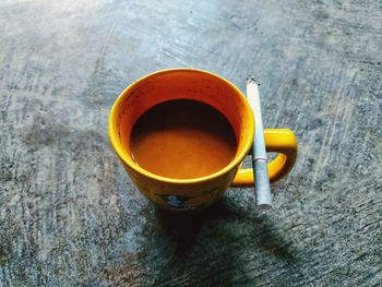 High angle view of coffee cup on table