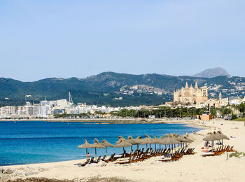 Scenic view of sea against clear blue sky