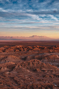 Scenic view of landscape against sky during sunset