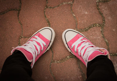 Low section of man standing outdoors