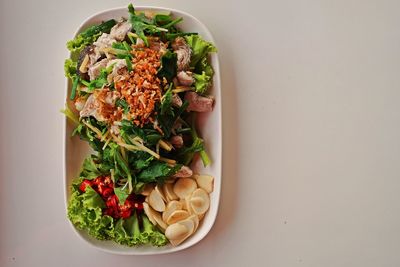 High angle view of salad in bowl on table