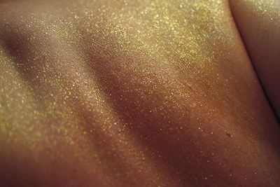Full frame shot of woman on wet glass