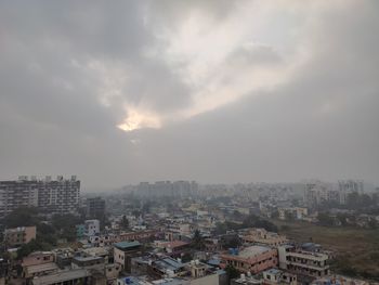 High angle view of buildings against sky