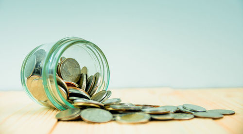 Close-up of coins on table