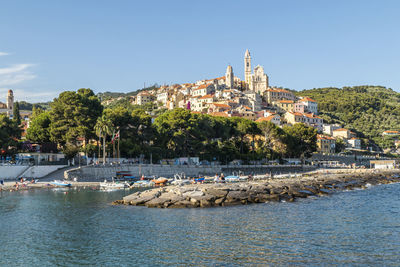 View of townscape by sea