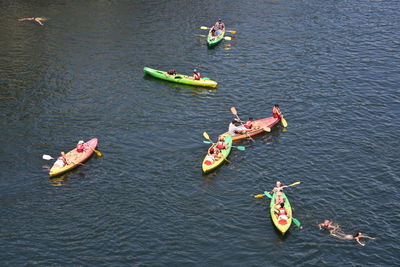 High angle view of people in boat on sea