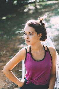 Portrait of young woman looking away