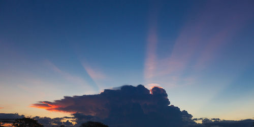 Low angle view of silhouette mountain against sky during sunset